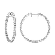 Designed in brightly polished 14 karat white gold, this gorgeous pair of inside out hoop earrings are the perfect fine jewelry accessory to treasure for a lifetime. These spectacular hoops feature 56 sparkling round brilliant cut diamonds prong set on the front of each hoop and inside totaling 2.70 carats of fire and brilliance. Ideal as an anniversary or birthday present, diamond hoops are timeless in style. White Gold Hoop Earrings, Round Diamond Earrings, Gold Diamond Hoop Earrings, White Gold Hoops, White Gold Earrings, Diamond Hoop Earrings, Fine Earrings, Gold Hoop Earrings, Diamond Stone