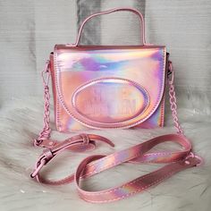 -Super Cute Holographic Iridescent Pink Chrome Bag With "Steve Madden" Embossed Logo On The Front -Bag Has Adjustable/Detachable Chainlink Faux Patent Leather Strap -Bag Can Be Worn As A Crossbody Bag, Shoulder Bag, Or As A Handbag -Inside Has One Zippered Wall Pocket With Two Sleeve Pockets -Has Magnetic Snap Closure -Has Matte Pink Hardware -New With Tags Dimensions: W:8" H:6½" D:3" Trendy Iridescent Bags, Trendy Iridescent Party Bag, Iridescent Rectangular Shoulder Bag For Party, Hot Pink Chrome, Leather Strap Bag, Holographic Iridescent, Pink Chrome, Matte Pink, Strap Bag