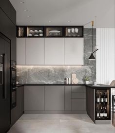 a modern kitchen with marble counter tops and stainless steel appliances, along with black cabinets