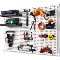 a peg board with various tools hanging on it