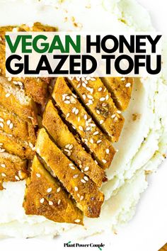 Overhead view of a baked tofu cutlet sliced on a bias sitting on top of mashed potatoes with text reading vegan honey glazed tofu Glazed Tofu, Simple Meal Prep, Vegan Honey, Honey Chicken Recipe, Tofu Chicken, Plant Based Lunch, Garlic Recipe, Honey Glazed, Vegan Lunches