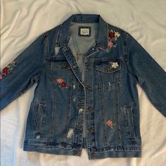 Nwot Denim Jacket, Lightly Distressed With Floral Stitching Size Medium, No Damage At All. Trendy Medium Wash Outerwear With Floral Embroidery, Trendy Blue Denim Jacket With Floral Embroidery, Casual Denim Jacket With Floral Embroidery, Denim Blue Outerwear With Floral Embroidery, Denim Blue Floral Embroidered Outerwear, Blue Denim Jacket With Floral Embroidery, Floral Stitching, Jean Jackets, Jean Coat