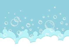 bubbles floating in the air on a blue sky with white clouds and light blue background