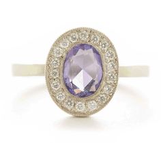 This 18k gold Lux plus ring features an 8x6mm purple sapphire accented with round full cut diamonds. Our Lux plus rings feature a more substantial band to accommodate deeper full cut gemstones. Stacks perfectly with the Hewn Hammered 2x2 Plain Band. Purple Oval Diamond Ring, Oval Purple Diamond Ring, Oval Purple Diamond Ring With Center Stone, Oval Purple Sapphire Ring For Anniversary, Oval Purple Platinum Rings, Lavender Diamond Oval Ring, Lavender Oval Diamond Ring, Purple Oval Sapphire Ring, Brilliant Cut, Purple Sapphire Oval Ring