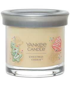 yankee candle christmas cookie jar with metal lid and silver rim, on white background photo