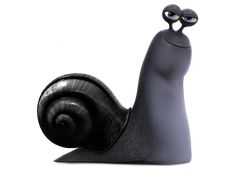 a black snail with two eyes on it's back