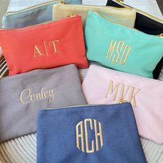 "These monogrammed cosmetic bags are the perfect size to keep your essentials handy in your tote, backpack, purse, diaper bag or gym bag. The sturdy cotton canvas is available in eight different colors so you can select your favorite - or get several! These monogrammed bags make a great gift for bridesmaids, girlfriends and graduates! Personalized with an embroidery monogram to make it extra special! ~ TO ORDER ~ 1. Choose your bag color from the drop-down list 2. REVIEW COLOR CHART and choose y Monogramming Ideas, Monogrammed Makeup Bags, Monogram Cosmetic Bag, Personalized Makeup Bag, Hot Pink Bag, Couples Monogram, Gift For Bridesmaids, Personalized Makeup Bags, Cosmetic Bag Set