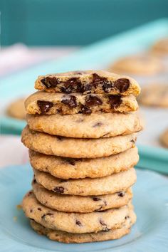 a stack of cookies sitting on top of a blue plate