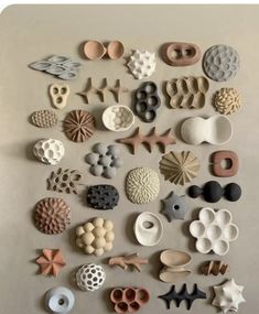 an assortment of different shapes and sizes of buttons