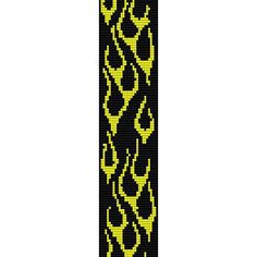 a yellow and black bracelet with an intricate design on it's side, in the middle