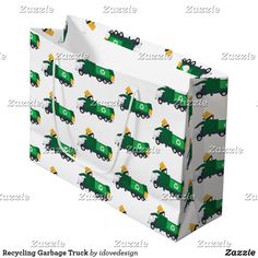 a paper bag with green and yellow garbage trucks on it, sitting in front of a white background