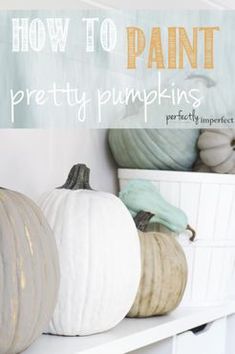 white pumpkins sitting on top of a shelf with the words how to paint pretty pumpkins