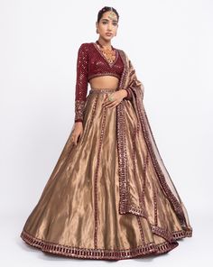 Mehroon embroidered blouse paired with copper tissue lehenga.From Vvani Vats Mahnoor collection.DELIVERY TIMEPlease allow 8-12 weeks for your outfit to arrive.FABRIC DETAILSVelvet, TissueProfessional cleaning only. Tissue Lehenga, Wedding Lengha, Vani Vats, Designer Bridal Lehenga Choli, Lehenga Dupatta, Indian Outfits Lehenga, Full Sleeve Blouse, Lehenga Blouse Designs, Designer Bridal Lehenga