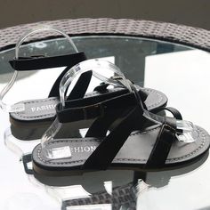 Belt Buckle Pure Color Thong Women Flat Beach Sandals Black T-strap Sandals With Buckle For Beach, Flat T-strap Sandals With Buckle Closure, Adjustable Flat T-strap Sandals With Buckle Closure, Black Adjustable T-strap Sandals With Buckle Closure, Black Jelly Sandals With Buckle Closure For Vacation, Trendy T-strap Sandals With Buckle Closure And Adjustable Fit, Trendy Adjustable T-strap Sandals With Buckle Closure, Flat T-strap Sandals With Buckle Closure For Vacation, Black T-strap Sandals With Adjustable Strap For Vacation