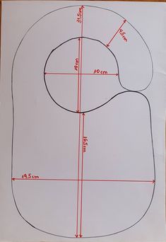 a drawing of a guitar with measurements for the neck and shoulder area, on a piece of white paper