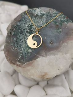 "Yin Yang necklace, ying yang charm, Solid Gold 14k, dainty necklace, delicate necklace, yin yang jewelry, gold coin necklace, disc pendant ♥ Material of pendant and chain: Solid Gold 14k ♥ Packaging: All of our jewelry is beautifully boxed and ready for gifting For more personalized designs take a look here: ♥ www.etsy.com/listing/631444472 ♥ www.etsy.com/listing/645292671 ♥ www.etsy.com/listing/645282627 ♥ www.etsy.com/listing/645285037 ♥ www.etsy.com/listing/645278199 ♥ www.etsy.com/listing/6 Minimalist Round Jewelry For Meditation, Symbolic Jewelry With Delicate Chain And Round Pendant, Symbolic Round Charm Necklace With Coin Pendant, Symbolic Charm Necklaces With Adjustable Chain, Symbolic Round Tarnish Resistant Necklace, Symbolic Round Tarnish-resistant Necklace, Symbolic Tarnish-resistant Necklace, Symbolic Round Charm Necklaces Tarnish Resistant, Symbolic Round Charm Necklace Tarnish Resistant