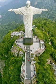 an aerial view of the statue of christ on top of a mountain in rio cristo