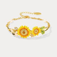 Be charmed by this exquisite Sunflower & Bee Bracelet, crafted from brass enamel for a timeless look and feel. Drawing on the romantic allure of the cottagecore aesthetic, this bracelet will become a treasured accessory to adorn your wrist with effortless grace. Add a touch of garden elegance to your look with the Sunflower & Bee Bracelet from Selenichast store. Detail Plating: 18K Gold Materials: 18K Gold on Brass, Enamel Size: Length: 6.30"(16cm)+Extender: 2.36"(6cm) Weight: 4.3g Hypoallergeni Bee Inspired Outfit, Bee Bracelet, Sunflower Bracelet, Cat Pendant Necklace, Sunflower Jewelry, Bee Inspired, Horses Pendant, Cat Pendants, Enamel Bracelet