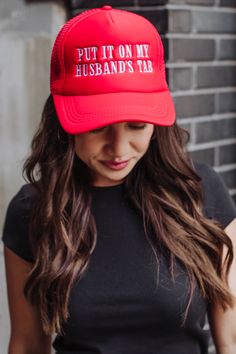 You'll be wearing this trucker hat on repeat! Our newest red trucker hat is a funny nudge at all the wonderful hubby's out there! Red Trucker Hat With Letter Print, Red 5-panel Trucker Hat, Red Trucker Snapback Hat, Fun Red Trucker Hat With Letter Print, Red Letter Print Snapback Trucker Hat, Red Snapback Trucker Hat, Fun Red Trucker Hat, Red Trucker Hat One Size Fits Most, Novelty Red Trucker Hat