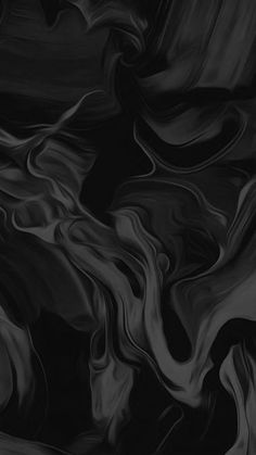 an abstract black and white background with swirls in the middle, as well as dark colors