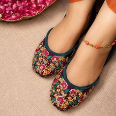 The 'Flora' jutti is beautifully adorned with fine resham and dabka work against a purple base enhanced with a scattering of sitaras. The bright and vibrant colors of this pair are perfect to set you in a festive mood. Upper and Back- Raw silk with Hand Embroidery Lining and sole- Fine leather Cushioning- Double padded sole and back for some extra comfort to avoid blisters 👉HOW TO MEASURE YOUR FOOT You can refer to our size chart to select your perfect jutti size. If you are confused about what Festive Zari Work Flats For Summer, Closed Toe Flats For Festive Summer Occasions, Closed Toe Flats For Festive Summer Events, Closed Toe Flats For Summer Festivals, Handwork Flats For Summer Festival, Summer Festival Flats With Handwork, Bollywood Flats With Zari Work For Festival, Bollywood Style Zari Work Flats For Festival, Festive Multicolor Gota Work Flats