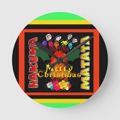 a clock with the words merry christmas written in different colors and designs on it's face