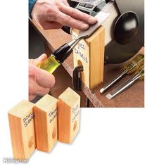 a man is using an electric device to make something out of wood