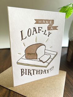 a birthday card with a loaf of bread on it