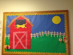 a bulletin board with a red barn on it