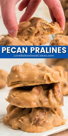 pecan pralies stacked on top of each other and being held by a hand