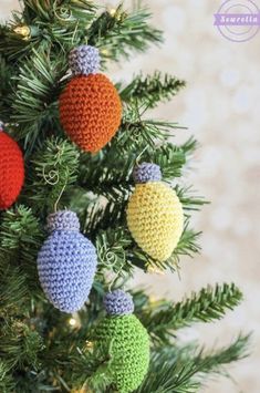 crocheted ornaments hanging from a christmas tree