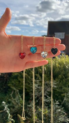 gold plated heart necklaces ♥️ * pick the colour of your crystal pendant: * blue, white, black or red  * sizing of heart charm: length 1.3cm width 1.3cm * necklace length = 18.5 inches to keep good care of your jewellery: * avoid leaving in direct sunlight  * remove before showering or exercising * if wet, dry with towel  * any issues with your purchase, please contact me for a refund or replacement  Check out my Instagram @sophsearringshop ♥️ Red Heart Necklace, Hook Necklace, Heart Necklaces, Gold Heart Necklace, Black Heart, Gorgeous Necklaces, Gold Plated Chains, Charm Necklaces, Crystal Pendant