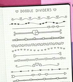 doodle dividers with hearts and arrows in the middle on top of a notebook