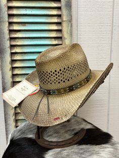 Bullhide hats are perfect for the cowgirl that loves the vintage look that feels very modern. This Bullhide From the Heart hat is a striking panama straw hat that grabs attention with an embellished, multi-color concho band and a stunning studded, colorful and tooled underbrim design. The fashion-forward cowgirl will never go wrong with Bullhide straw hats. Studded, tooled underbrim design Pinch front crease crown 3.75" brim Panama straw construction Embellished multi-color studded band Western Store, Western Cowboy Hats, Cowgirl Hat, Cowgirl Western, Western Cowgirls, Straw Hats, Western Hats, Western Cowgirl, Cowgirl Hats