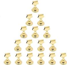 a christmas tree made out of gold knobs on a white background with clipping for text