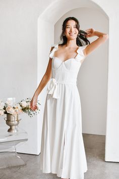 If you're looking for the ultimate European summer dress, try our Francoise Corset Midi dress. This classic wardrobe piece features a luxe white linen-blend fabric and a bustier-style bodice with sweetheart neckline. The shoulder ruffles are feminine and flirty, while the midi length is just right for summer brides or European summer night out. Pair with wedges or slides for a show-stopping outfit that's sure to turn heads! European Summer Night, European Summer Dress, Classic Wardrobe Pieces, Cowgirl Bachelorette, Dresses Date Night, Corset Midi Dress, Summer Bride, Destination Dress, Cool Girl Style