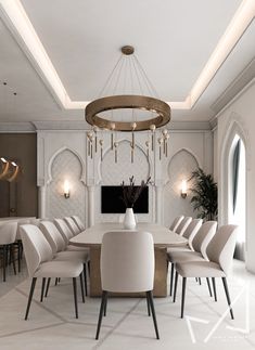 an elegant dining room with white chairs and a chandelier hanging from the ceiling