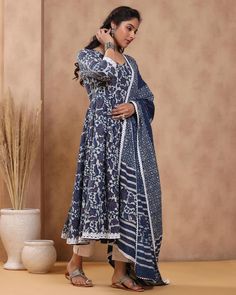 This is a beautiful 3-piece anarkali suit set. The set includes anarkali kurta with 32 kali has round neck, 3/4th sleeves & calf length teamed with solid cotton pants with elasticated waistband and a cotton printed dupatta with lace detailing. 3-piece set Suit Fabric-Cotton Dupatta Fabric-Cotton Length-Calf Length Color - Blue & White Neck-Round Neck Sleeves - Sleeves Washing Care-Dry Clean or Quick Deep Wash DISCLAIMER - The color of the product may be differ due to screen settings of device. Cotton Printed Anarkali, Printed Anarkali Suits, Cotton Anarkali Suits, Printed Anarkali, Dabu Print, Cotton Anarkali, Printed Dupatta, Anarkali Kurta, Anarkali Suit