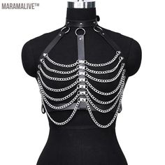 Transform your outfit with the edgy and stylish Fashion Belt. This corset-style chain belt features trendy tassels and is adjustable for a perfect fit. Elevate any look with this versatile and wild accessory, ideal for adding a touch of gothic flair to your wardrobe. SPECIFICATIONS Brand Name: Maramalive™ Department Name: ADULT Belts Material: PU Belts Material: Faux Leather Origin: Mainland China CN: Zhejiang Gender: WOMEN Style: Fashion Pattern Type: Solid Item Type: Belts Place Of Origin: China (mainland) Choice: yes Tassel Outfit, Rave Concert, Chain Harness, Tassel Belt, Leather Bra, Body Chains, Street Style Edgy, Leather Harness, Estilo Punk