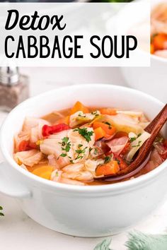 a close up of a bowl of soup with carrots