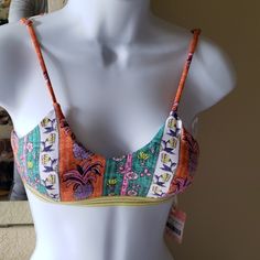 Multi Color Playful Adjustable Strap Swimwear For Pool, Playful Triangle Top Tankini For Vacation, Playful Swimwear With Adjustable Straps For Pool, Multicolor Padded Swimwear For Sunbathing, Multicolor Padded Swimwear For Vacation, Multicolor Padded Swimwear For Beach Party, Vacation Multicolor Padded Cups Swimwear, Vacation Multicolor Padded Swimwear, Playful Orange Swimwear For Vacation