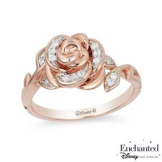 a rose ring with diamonds on it