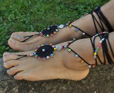 This listing is for a pair of black gipsy mandala barefoot sandals. Beautiful and unique barefoot sandals with a tribal vibration. Handmade crocheted with love and care using black waxed polyester cord, tibetan silver beads and czech seed beads. They will embellish your feet and you can wear it with sandals in a variety of styles from work to casual to evening attire. Beautiful to wear on a beach or garden wedding. Great and very comfortable for making yoga, hula hoop, belly dance and dancing. T Bohemian Black Anklets For Party, Black Bohemian Anklets For Party, Summer Festival Jewelry With Black Beads, Black Barefoot Sandals For Summer Festival, Black Bohemian Barefoot Sandals For Beach, Adjustable Black Bohemian Barefoot Sandals, Handmade Black Barefoot Sandals For Beach, Black Beaded Festival Anklets, Black Bohemian Anklets With Black Beads