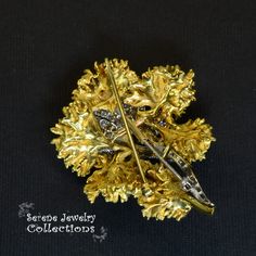 Fancy Yellow 18k gold Vintage Diamond Flower Brooch! This brooch separates into two different brooches. One is 18k white gold and set with 4.06 carats of diamonds. The larger 18k yellow gold brooch wraps around the inner brooch seamlessly. Please refer to one of the hand photos to view the pieces separated. Total Weight: 32.06 grams Size: 2.2 inches tall, 1.8 inch wide Precious Metal: 18k yellow gold Precious stones: -White Round Diamonds: 4.06 carats Hallmark: 18k Formal Yellow Gold Brooches With Single Cut Diamonds, Hallmarked Yellow Gold Brooches For Evening, Gift Yellow Gold Brooches With Single Cut Diamonds, Gold Brooches With Single Cut Diamonds For Gift, Elegant Yellow Gold Brooch With Rose Cut Diamonds, Elegant Yellow Gold Brooches With Rose Cut Diamonds, Evening Yellow Gold Hallmarked Brooches, Hallmarked Yellow Gold Evening Brooches, Hallmarked Yellow Gold Evening Brooch