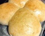 four bread rolls sitting on top of each other