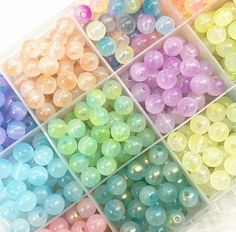 there are many different colors of beads in the box