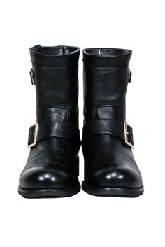 These distinct Jimmy Choo short boots are perfect for making a fashion statement! Crafted with black leather and standout buckle detail, these booties are sure to turn heads. Slip them on with your favorite jeans and a cozy coat! Size 7.5 (IT 37.5) Made in Italy 100% Leather Rubber sole Buckle closure details Shaft 7" Circumference 12.75" Heel height 1.5" Cozy Coats, Short Boots, Favorite Jeans, Jimmy Choo, Fashion Statement, Rubber Sole, Heel Height, Black Leather, In Italy