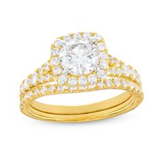 Embrace the bliss in every moment of your love story with this round lab-created diamond cushion-frame bridal set in 14K gold. Crafted in 14K gold The engagement ring showcases a 1 ct. certified round lab-created diamond boasting a color rank of I and clarity of Si2. Lab-created diamonds line the cushion-shaped frame and the subtly split shank. Completing the look, the contoured wedding band shimmers with lab-created diamonds. Includes certification card This bridal set shines with 1-7/8 cts. t. Formal Moissanite Bridal Sets With Halo Setting, Dazzling Wedding Ring With Halo Setting, Dazzling Halo Setting Wedding Ring, Formal Cubic Zirconia Halo Bridal Set, Wedding Diamond Ring With Cushion Cut, Yellow Gold Bridal Sets With Brilliant Cut Cubic Zirconia, Cushion Cut Diamond Ring With Prong Setting For Wedding, Cubic Zirconia Bridal Set With Prong Setting, Yellow Gold Brilliant Cut Cubic Zirconia Bridal Sets