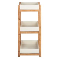 a wooden shelf with two white baskets on it's sides and one is empty