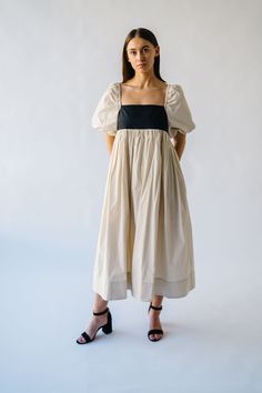 Get ready to slay in the Ambreen Puff Sleeve Maxi Dress! This unique dress features trendy puff sleeves and a flattering maxi length. The beige color adds a touch of sophistication, making it perfect for any special occasion. Stand out in style with this playful and chic dress! Details self: 100% cotton lining: 100% polyester Fabric Care Guide Here Sizing & Fit Measurements are approximate and taken while laying flat across the front. Not doubled. x-small: bust = 15"; length = 45" small: bust = Chic Beige Puff Sleeve Dress For Fall, Beige Puff Sleeve Maxi Dress For Summer, Chic Puff Sleeve Midi Dress With Voluminous Fit, Chic Beige Empire Waist Dress, Chic Voluminous Puff Sleeve Midi Dress, Beige Puff Sleeve Midi Dress For Summer, Puff Sleeve Maxi Dress With Gathered Sleeves, Beige Midi Puff Sleeve Summer Dress, Beige Puff Sleeve Midi Dress For Brunch